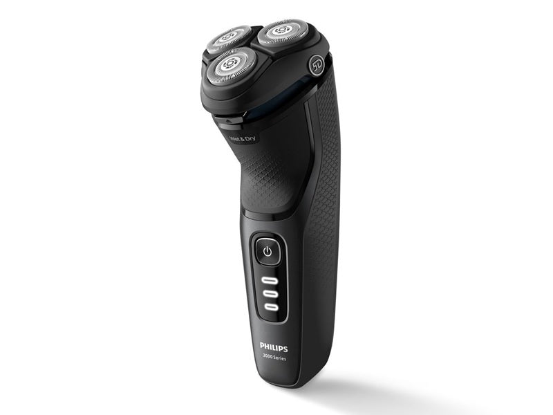 Philips Series 3000 shaver S3244/12 shown upright with rotary heads and power button