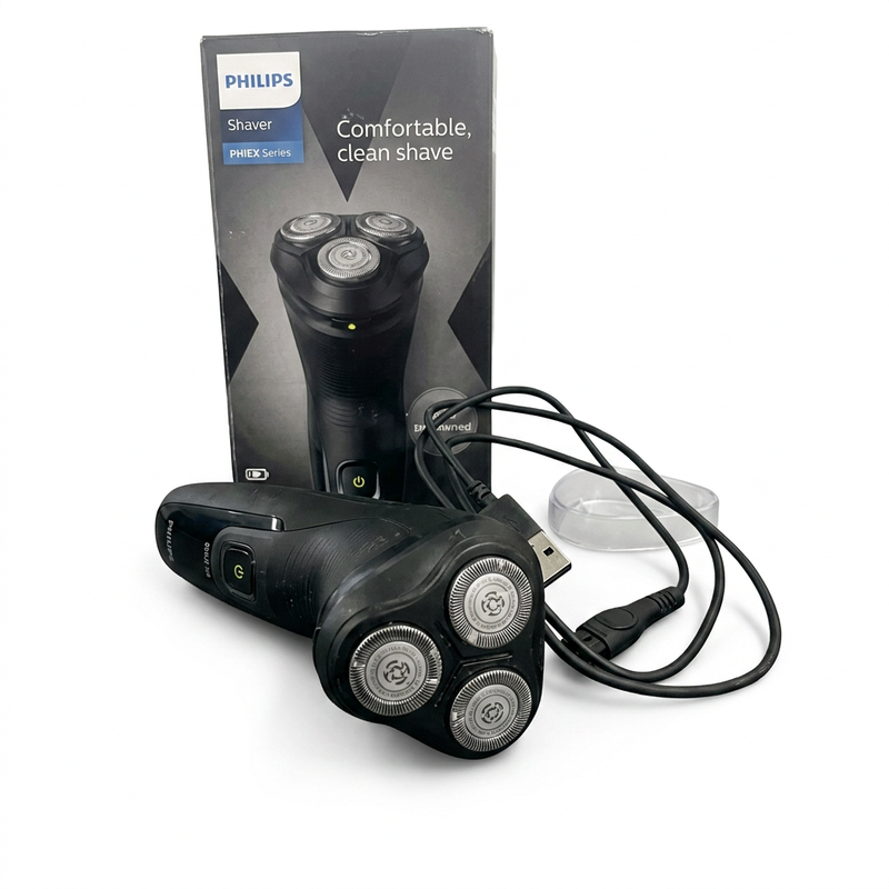 Philips Shaver 3000X Series close-up of rotary shaving heads with box and cable behind